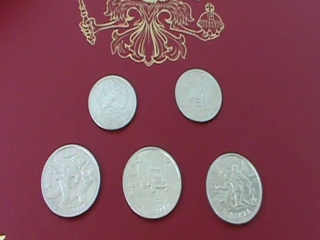 Купить памятные юбилейные монеты россии